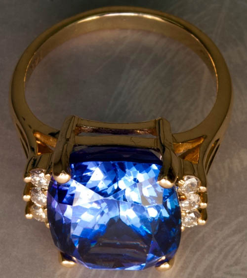 Previously owned Tanzanite diamond 14K ring.