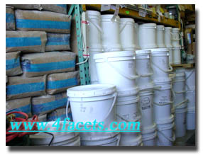 Photo shows Wesley's Trading Post own - WELL STOCKED Newport, warehouse showing just a portion of our large inventory of bulk abrasive grits or bulk polish for rock tumblers, to lapidary cutting oil and supplies.  NOTE: Large container quanities are available 7 days a week.  A northwest supplier stocking everything for the rockhound plus tools, supplies and equipment for lapidary, jewelry manufacturing and industrial applications. If you work on Jewelry, Stone, Glass, or Quartz, you need our products, Order NOW